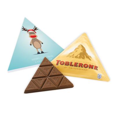Image of Personalised Christmas Triangular Toblerone box. Printed Christmas chocolate Toblerone